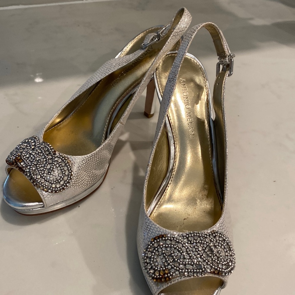 Silver with rhinestones Antonio Melani 3” heels. Size 8.5.